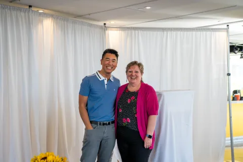 Two people posing for photo